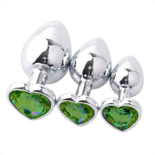 Here is an image of stainless steel heart-shaped anal plugs in sizes ranging from 2.76 to 3.54 inches in length and 1.10 to 1.57 inches in width.