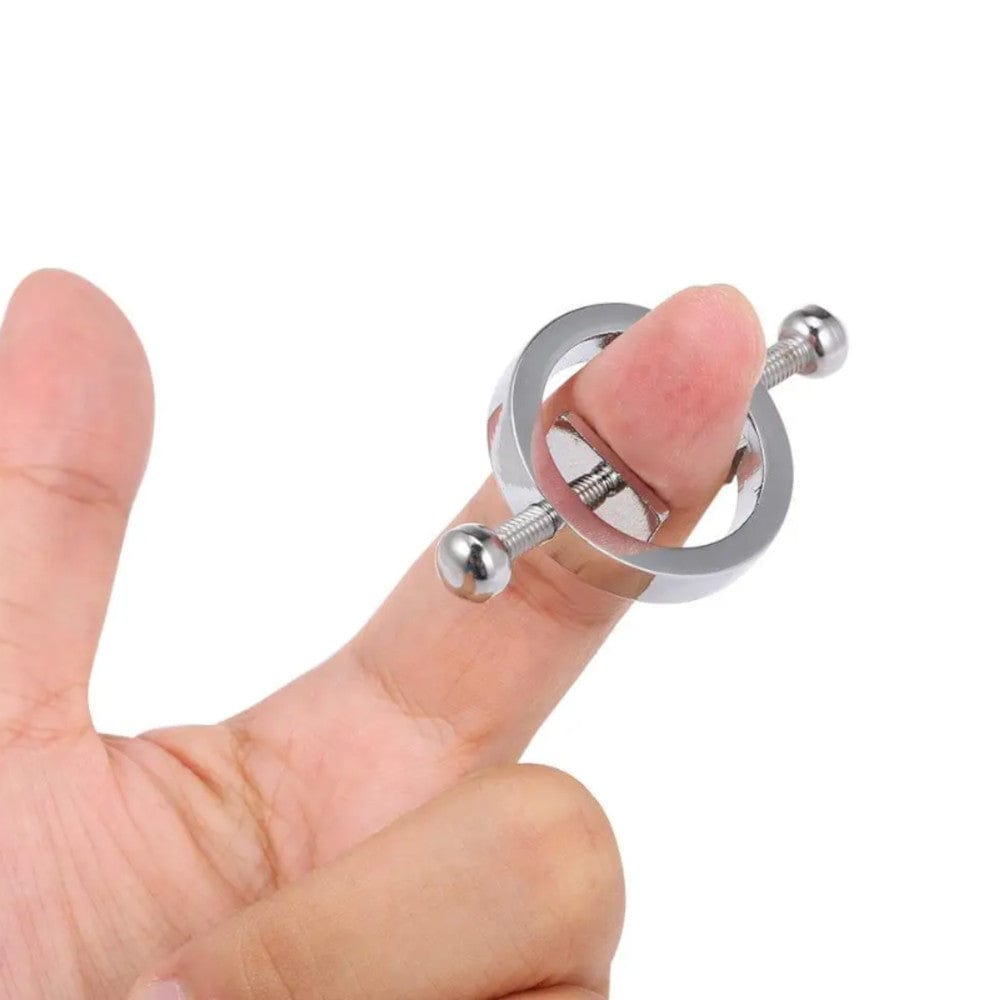 In the photograph, you can see an image of the unique rectangular heads of the Toothed Nipple Clamps designed to grip and stimulate.