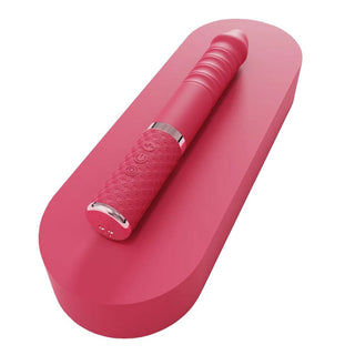 Featuring an image of Enchanted Wand Pumping Thrusting Dildo Vibe, featuring eight exciting functions for a unique experience.