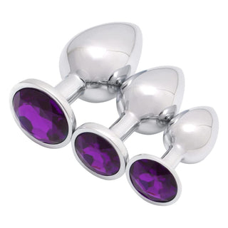Featuring an image of stainless steel plugs in varying sizes from 1 to 1.57 inches in width and 2.76 to 3.74 inches in length for comfort and arousal.