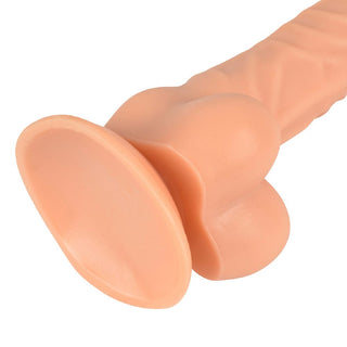 Feast your eyes on an image of a suction cupped strap-on dildo for intense penetration play, reaching the peak of pleasure with textured ribs and a ridge for stimulating nerve endings and exploring new pleasure zones.
