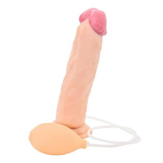 This is an image of a Squirting Dildo with soft rubber material in a flesh color, ready to fulfill your desires.