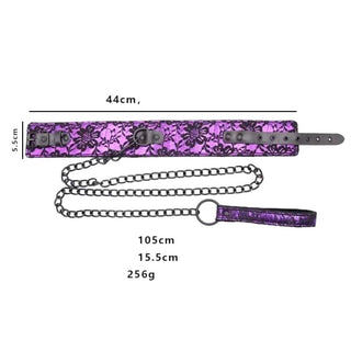 A picture of the Petplay Fetish Choker Purple Kink Collar And Leash set made from synthetic leather, offering durability and comfort, perfect for exploring dominance and submission fantasies.