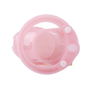 This is an image of a pink cage designed for male chastity play, perfect for exploring new realms of pleasure.
