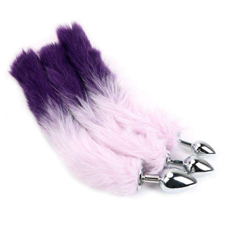 Take a look at an image of Purple Fur Silver Metallic Cat Tail Plug 17 to 18 inches long with a sleek, silver metallic plug and a flirty, purple faux fur tail.