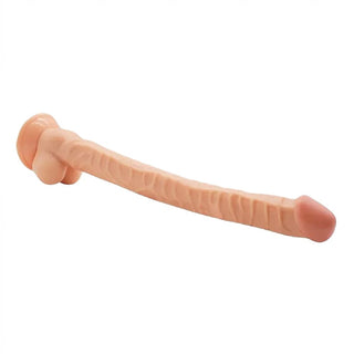 Presenting an image of a long and textured dildo with ribs and a ridge running along the center, designed for intense penetration play and reaching new pleasure zones.