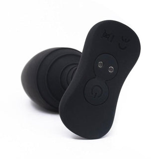 In the photograph, you can see an image of Shock And Awe Anal Vibrator Remote showcasing its premium silicone material.