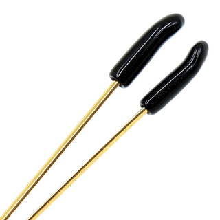 Featuring an image of Golden Nipple Clamps for Couples, providing a striking contrast with black rubber-tipped ends against the sleek golden finish, ensuring a secure fit for sensational play.