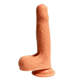 What you see is an image of Uncircumcised 7 Inch Dildo With Testicles and Suction Cup, made from medical-grade silicone with veiny shaft and exposed foreskin for realistic pleasure.