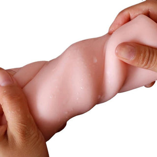 Intimate toy for solo play featuring nose, lips, tongue, and tonsil details.
