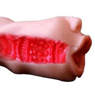 Flesh-colored TPE male stroker toy measuring 5.39 inches in length.