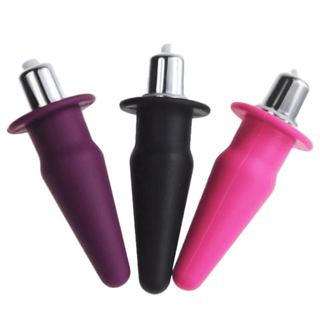 In the photograph, you can see an image of Silicone Jelly Ass Toy in plum color with mini cone-shaped design.