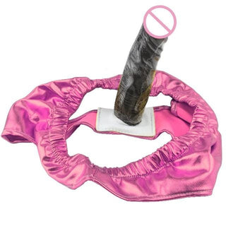 This is an image of Elastic Briefs with a stretchable fabric brief and a discreet 5.3-inch silicone dildo.