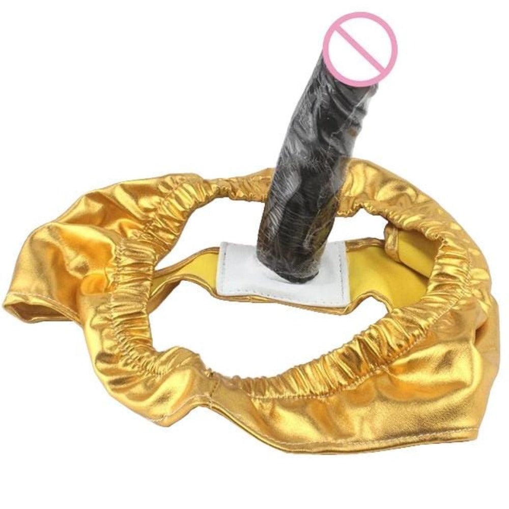 Feast your eyes on an image of Elastic Briefs in gold, pink, and red colors, featuring a 5.3-inch silicone dildo.