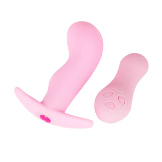 Pictured here is an image of Remote Controlled Silicone Vibrating Butt Plug 4.33 Inches Long with a textured silicone surface.