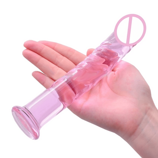 Take a look at an image of Ribbed Masturbation Stimulator Pink Dildo, a shatter-proof borosilicate glass dildo that is non-toxic and body-safe for worry-free erotic pleasure.