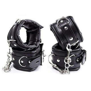 Here is an image of Badass Leather Bondage Restraint with Hand Thigh Ankle Cuffs in premium black PU leather and metal for dominance and submission play.