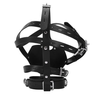 A close-up image of the adjustable straps and D-ring of Ruthless Punishment Muzzle for secure fit and control.