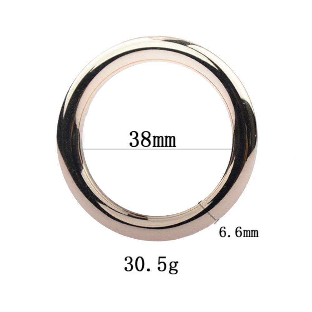 This is an image of Gold Non-Vibrating Cock Ring | Penile Exerciser Gold Ring with a flawless gold finish for a touch of sophistication.