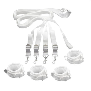 Pictured here is an image of Slut Favorite Padded Leather Bed Cuffs Bondage Strap in white color, made from synthetic leather and nylon, designed for adventurous play.