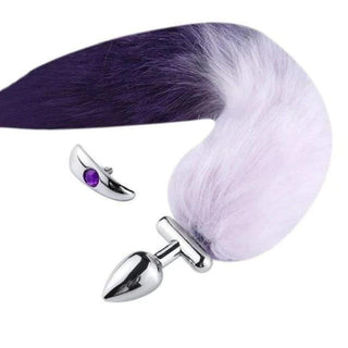 Presenting an image of 18 Shapeable White With Purple Fox Tail Butt Plug Metal, showcasing the luxurious faux fur tail in soothing white and purple hues.