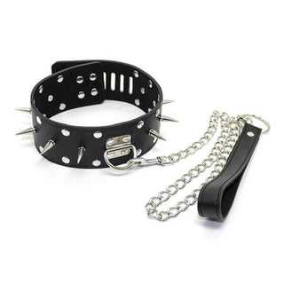 You are looking at an image of Black Fetish Barbed or Spiked Leather Collar Leash BDSM Toy asserting dominance with metal spikes.