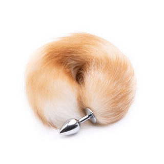 This is an image of 16 - 17 Light Brown Fox Tail Metal plug with stainless steel and faux fur materials