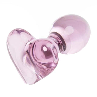 This is an image of Pink Crystal Butt Massager, a luxurious prostate massager with a heart-shaped base for secure positioning.