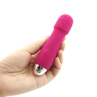 This is an image of Pocket Wand Mic Mini Wand Massager with a length of 4.92 inches and a diameter of 1.18 inches.
