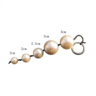 Golden Orb Anal Sex Toy String Balls made of premium plastic with a smooth, golden texture for comfortable and safe use.