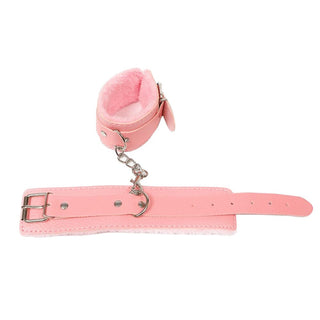 Tender touch pink fuzzy cuffs with Synthetic LeatherPlus material for stylish and pleasurable experiences.