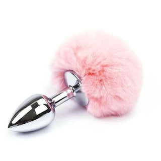 Presenting an image of Cute and Fluffy Bunny Tail Butt Plug 3 Inches Long in playful pink color with stainless steel plug.