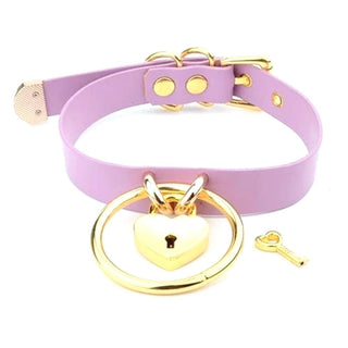 What you see is an image of Golden Kawaii Heart Locking Collar Day Collar with gold-plated metal hardware and heart-shaped padlock symbolizing dominance.