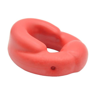 Red silicone cock and ball ring providing enhanced pleasure and vigor for intimate moments.
