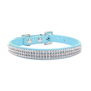 Take a look at an image of Glittery Submissive Day Jewelry Day Collar in red and blue colors with shimmering Swarovski-like jewels on PU leather straps.
