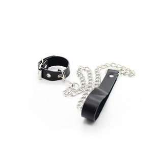 In the photograph, you can see an image of Bondage Games Leather Dick Ring Leash showcasing its adjustable leather ring, metal chain, and dual-purpose leather handle.