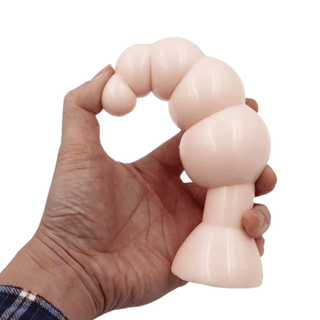 View of a bumpy anal toy with a comfortable neck for extended wear and easy cleaning.