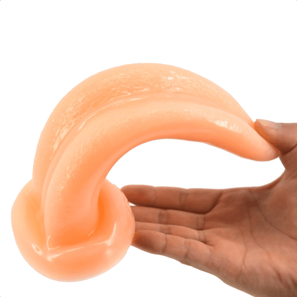 This is an image of the Tongue Stimulation Monster Dildo in white, resembling a tongue for a mouth-watering experience.