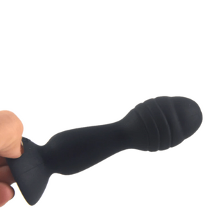 Colorful mini anal dildo with bumpy shape and tapered base for comfortable use.