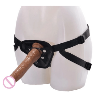 In the photograph, you can see an image of Pegging Fun Strap On Dildo for Couples in brown color with adjustable straps