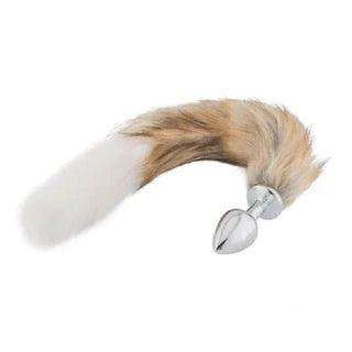 This is an image of the sleek stainless steel plug with a tapered tip for pleasurable penetration and a soft faux fur tail swaying seductively.