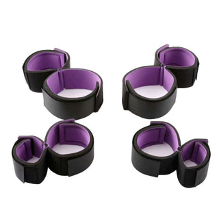 Presenting an image of Velcro Wrist and Thigh Cuffs for Sex, black with purple colors, adjustable rubber material.
