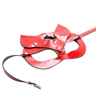 Adjustable synthetic leather mask in striking red color for mysterious play.