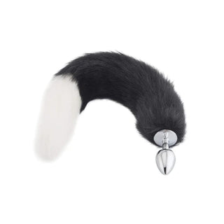 A visual of 18-Inch Black with White Fox Tail Plug Stainless Steel, featuring a versatile design with 3.74-inch plug length and 1.61-inch width, suitable for all levels of experience.
