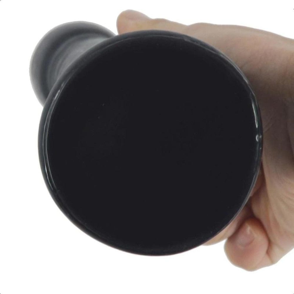 You are looking at an image of the Big Bad Cone-Shaped Anal Plug in black, flesh, and purple variations, made of TPE material, with a length of 7.48 inches and a width ranging from 1.57 to 3.07 inches.