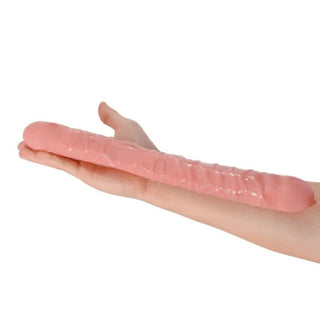 This is an image of the Flesh-colored 13-inch double dildo made of silicone for deep and realistic pleasure.