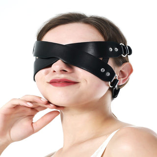 Intimate accessory with wide coverage for enhanced sensory deprivation experience.