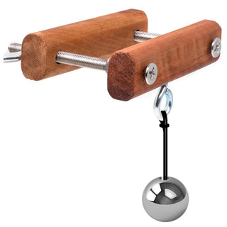 Feast your eyes on an image of Wooden Ball Buster Compressor, a device for asserting dominance and control in pleasure play.