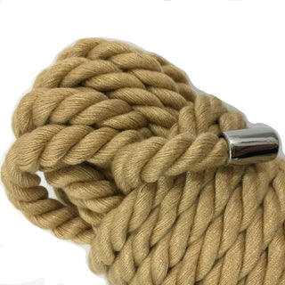 What you see is an image of the brown bondage rope hogtie made from cotton and nylon for comfort and safety in bondage play.