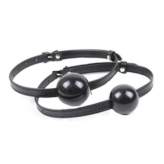 What you see is an image of Classic BDSM Silicone Gag in black color with PU leather straps for durability and comfort.